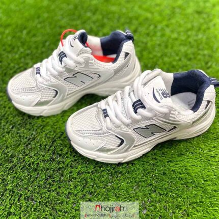 خرید و قیمت کتانی نیوبالانس Newbalance بچگانه سفید سورمه ای کد BC108 از حجره